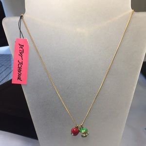 Uniquely Betsey Johnson red & green apple with crystals pendants on gold chain.